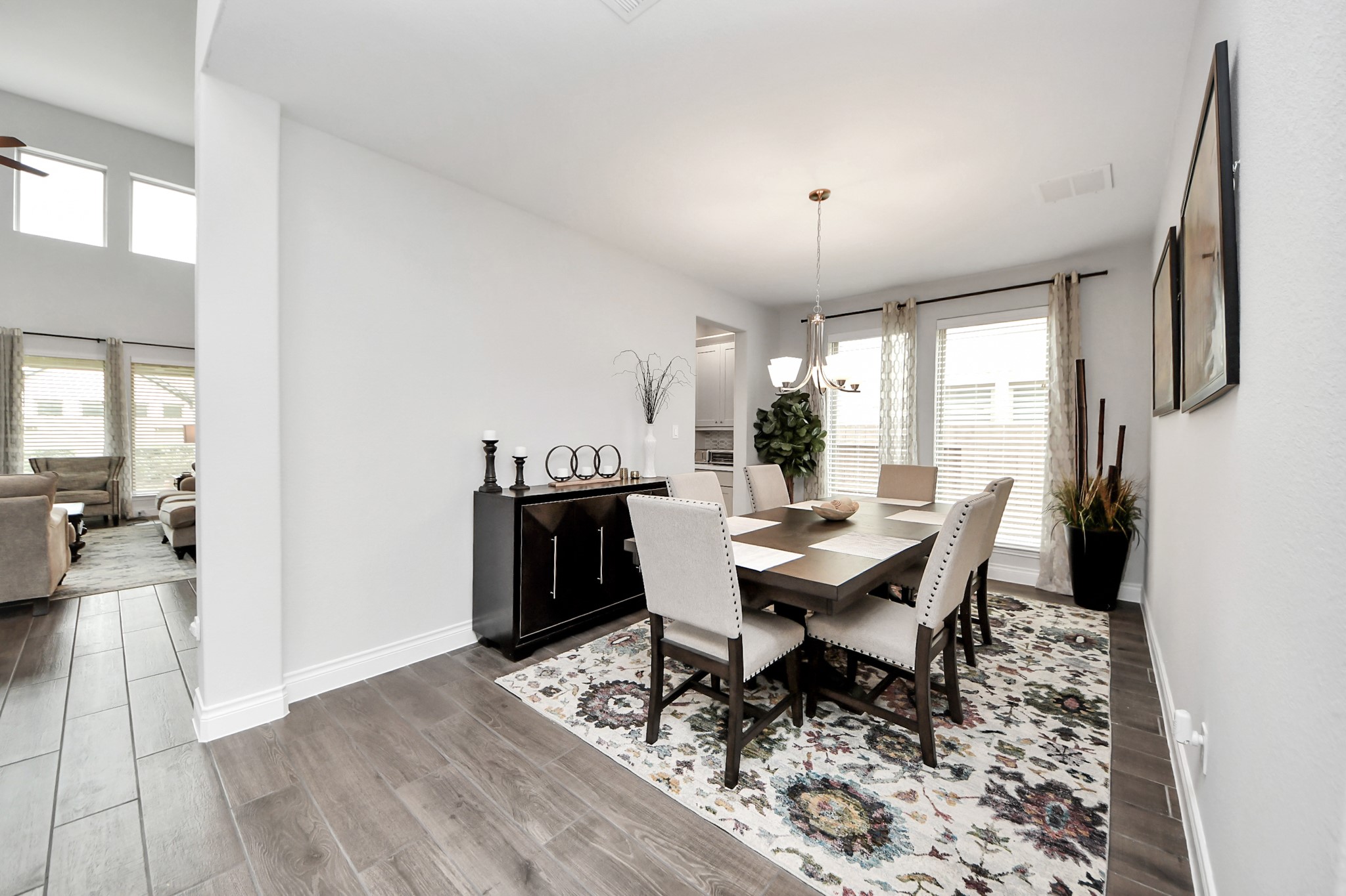 2242 Bayleaf Manor Drive Manvel, TX 77578 - Photo 18 of 48 a view of a dining room with furniture window and wooden floor