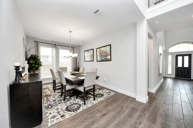 a kitchen with a sink a counter top space and stainless steel appliances