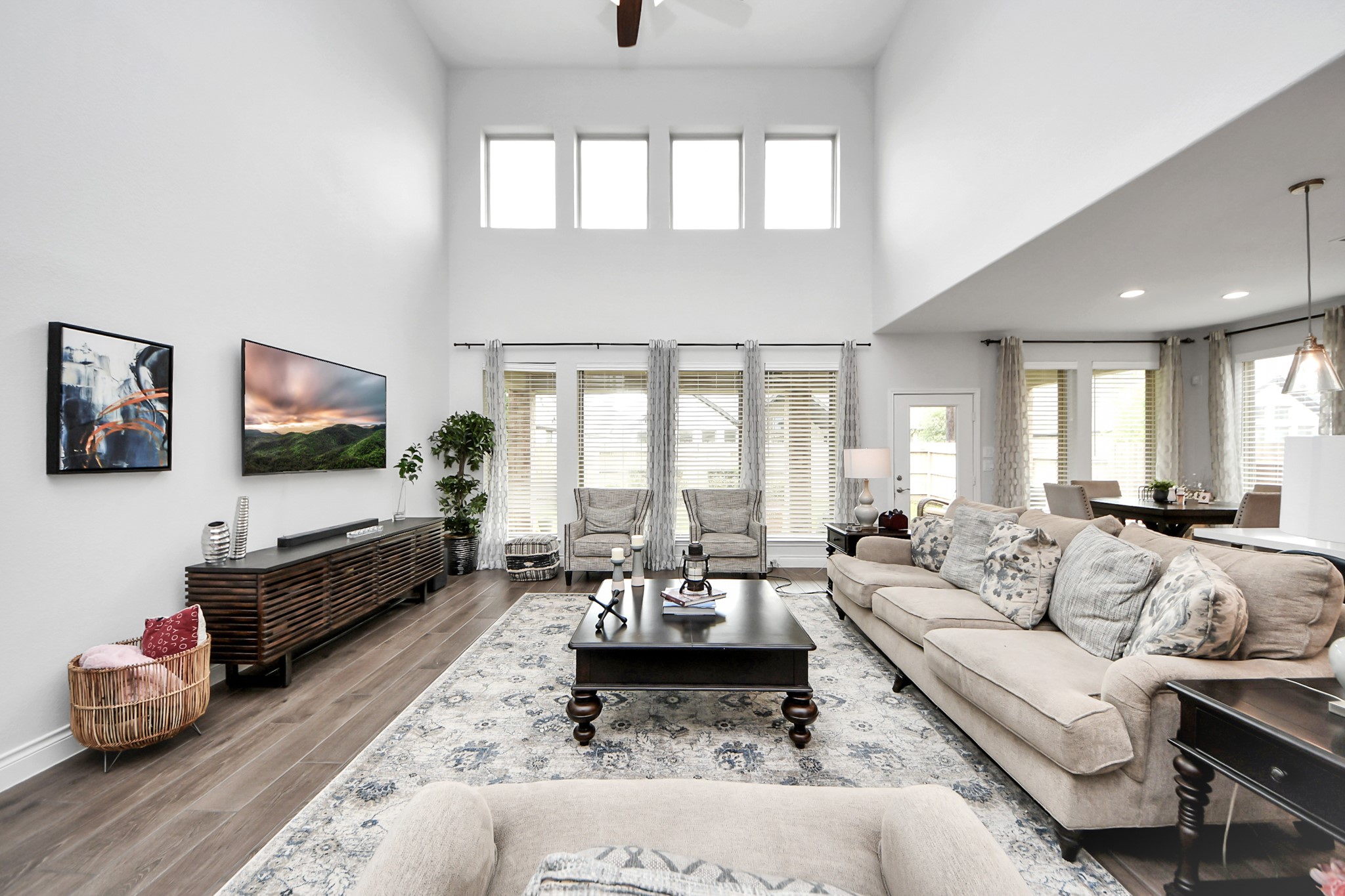 2242 Bayleaf Manor Drive Manvel, TX 77578 - Photo 28 of 48 a living room with furniture and a flat screen tv
