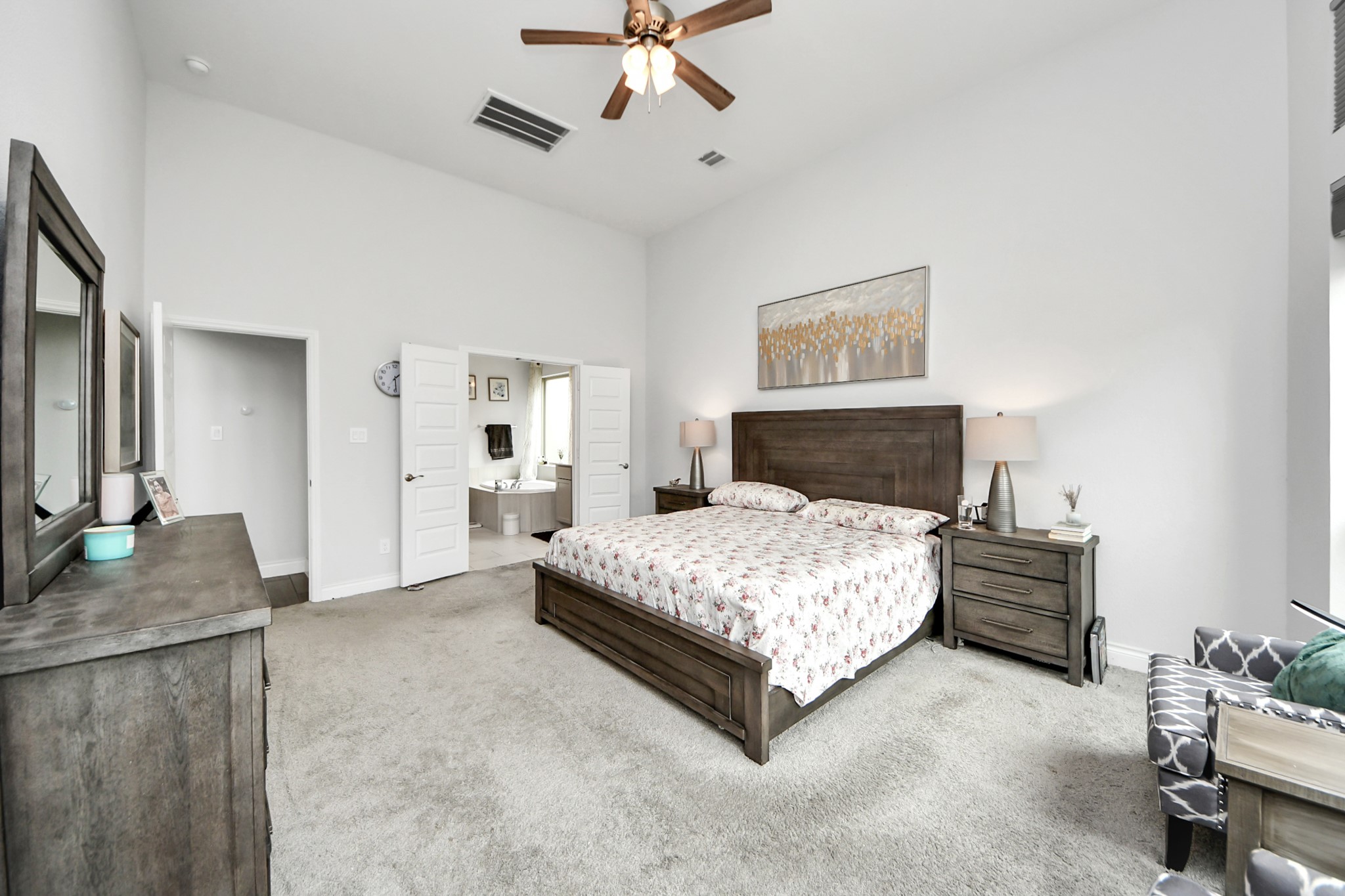 2242 Bayleaf Manor Drive Manvel, TX 77578 - Photo 29 of 48 a bedroom with a bed couch and dresser