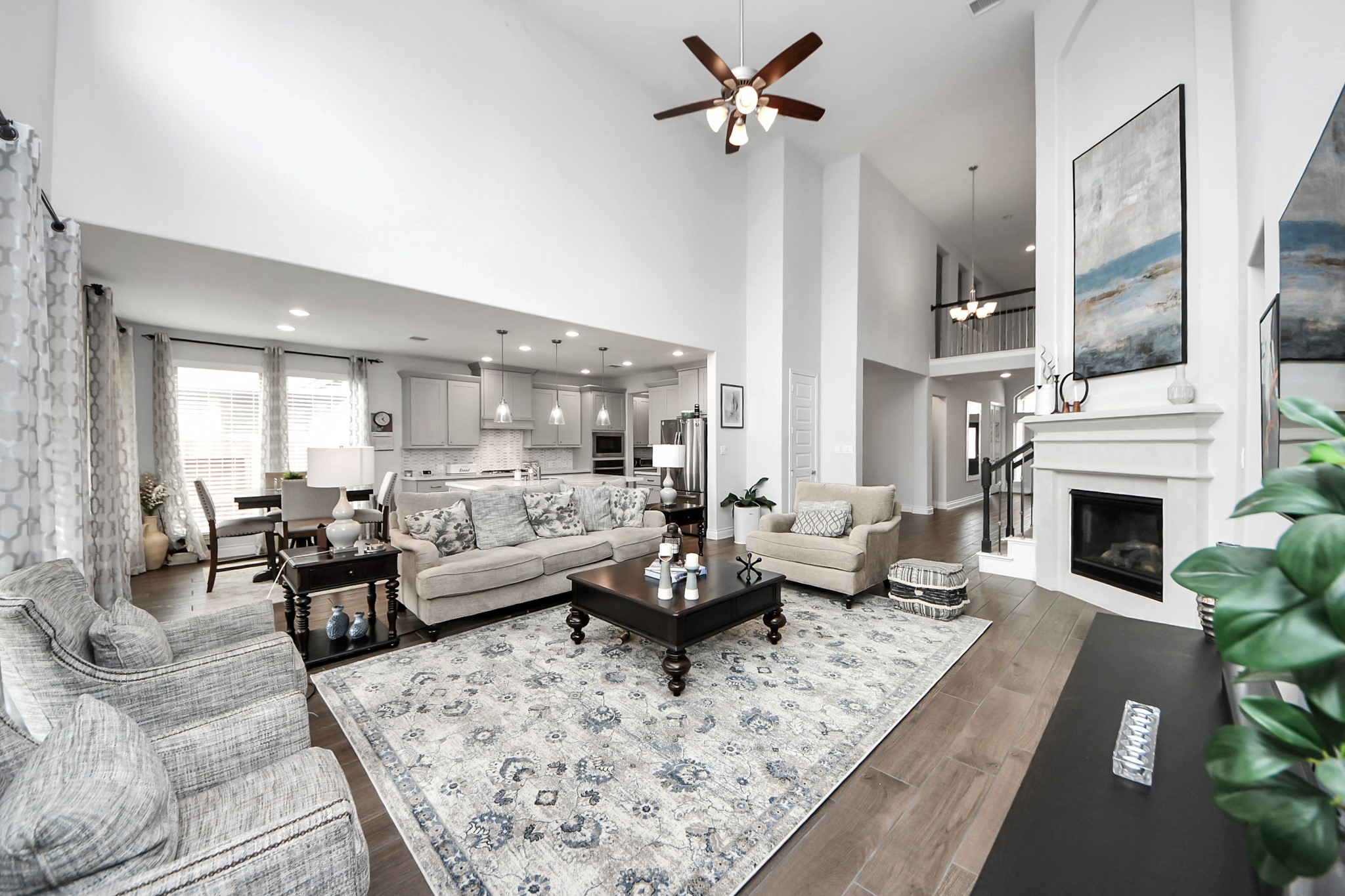 2242 Bayleaf Manor Drive Manvel, TX 77578 - Photo 3 of 48 a living room with furniture fireplace and a fireplace