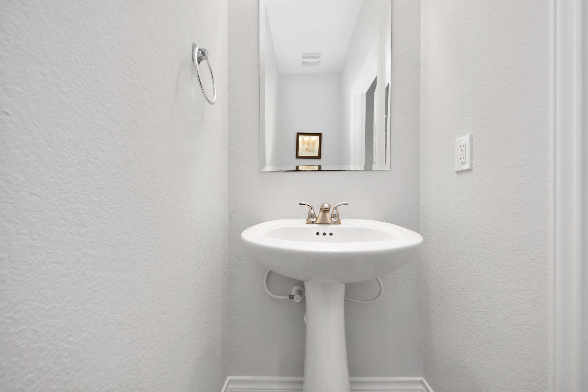 2242 Bayleaf Manor Drive Manvel, TX 77578 - Photo 37 of 50 a bathroom with a sink a mirror and vanity