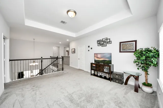 a bathroom with a sink a mirror and vanity