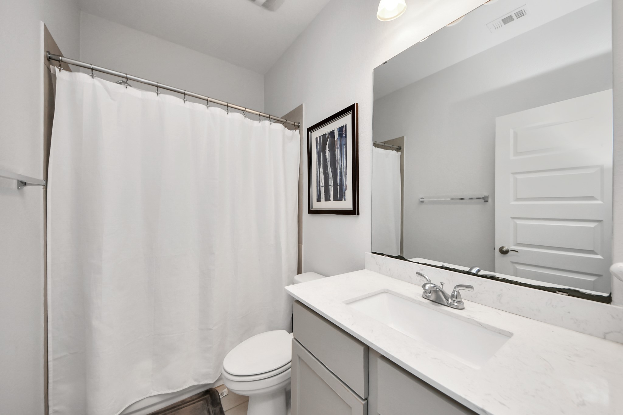 2242 Bayleaf Manor Drive Manvel, TX 77578 - Photo 40 of 50 a bathroom with a sink and a mirror