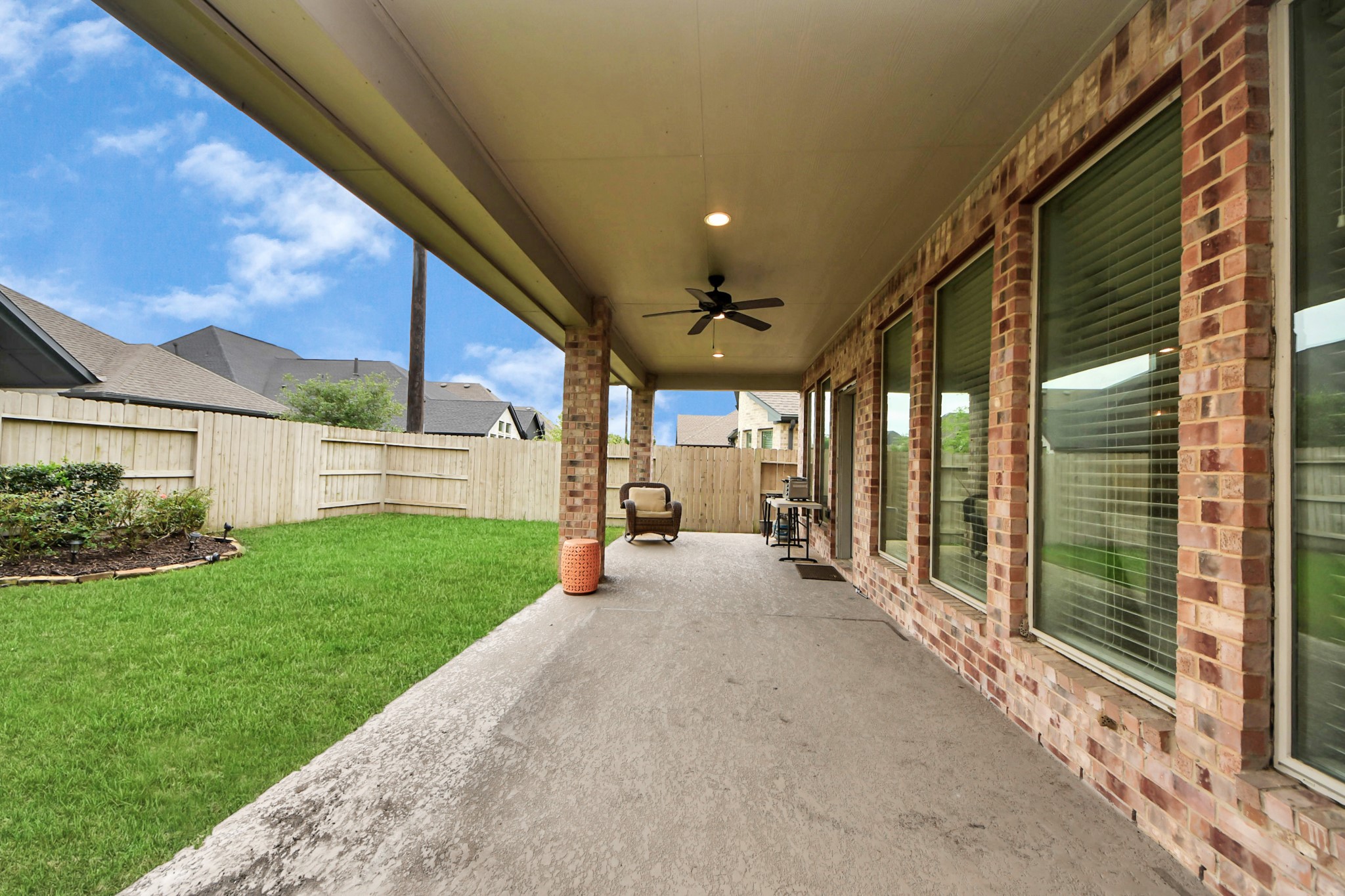2242 Bayleaf Manor Drive Manvel, TX 77578 - Photo 46 of 48 a view of a porch with a backyard