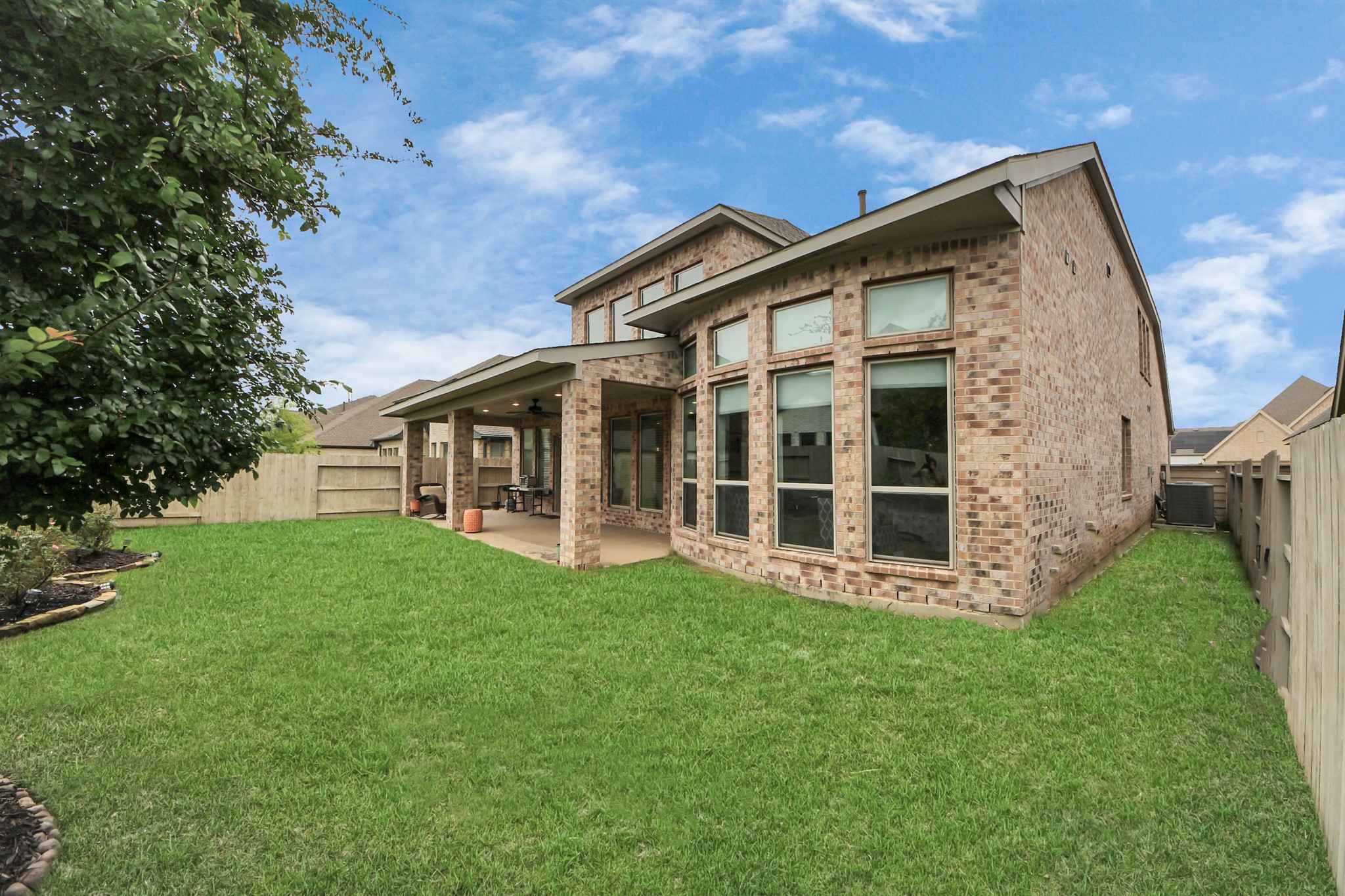 2242 Bayleaf Manor Drive Manvel, TX 77578 - Photo 47 of 48 a view of front of house with a yard