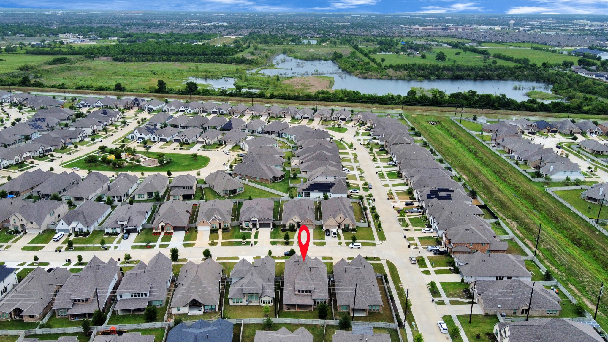 2242 Bayleaf Manor Drive Manvel, TX 77578 - Photo 6 of 48 an aerial view of residential building and lake