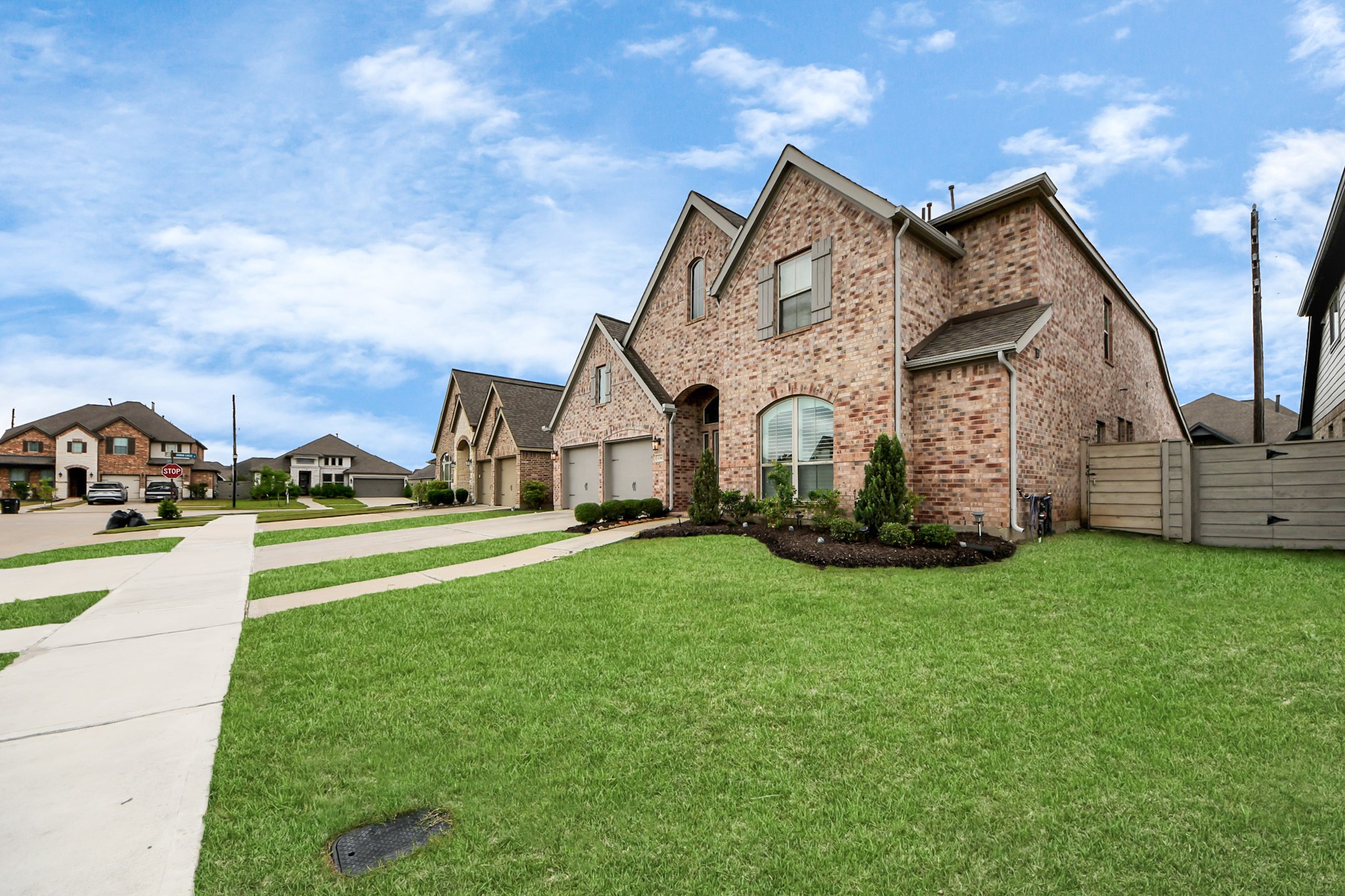 2242 Bayleaf Manor Drive Manvel, TX 77578 - Photo 9 of 48 a view of a house with a big yard