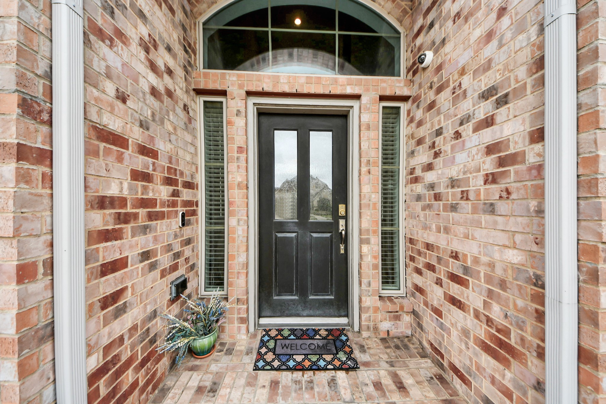 2242 Bayleaf Manor Drive Manvel, TX 77578 - Photo 10 of 48 a view of a door with a door and a window