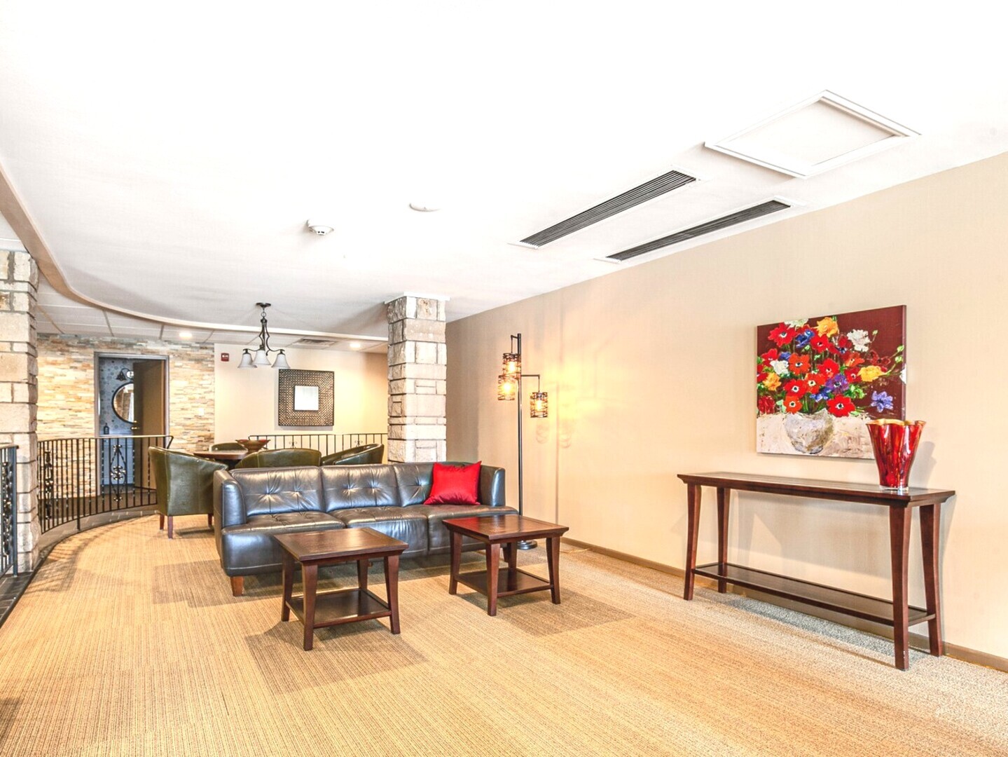 2300 Windsor Mall, Unit 2G Park Ridge, IL 60068 - Photo 11 of 15 a living room with furniture a rug and white walls