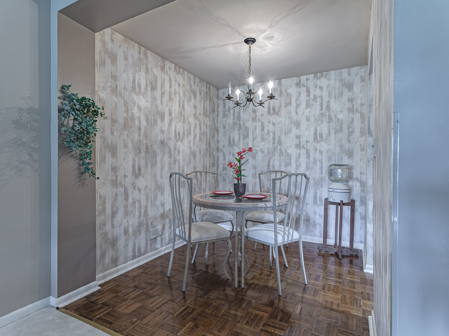 2300 Windsor Mall, Unit 2G Park Ridge, IL 60068 - Photo 7 of 15 a view of a dining room with furniture and chandelier