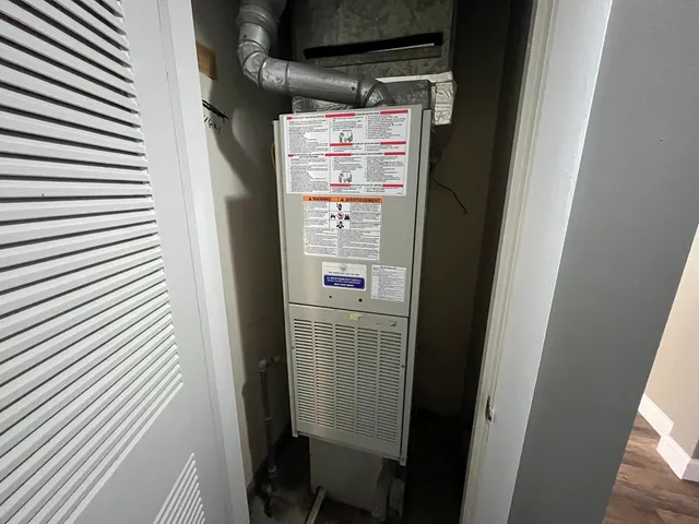 a view of a refrigerator in kitchen