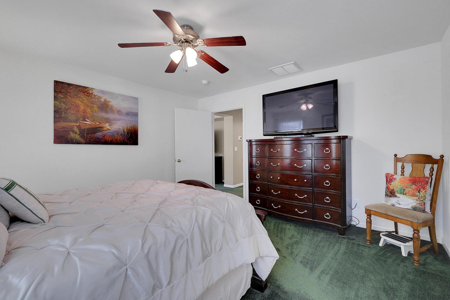 9840 Ellis Way Live Oak, CA 95953 - Photo 27 of 44 a bedroom with a bed and a television
