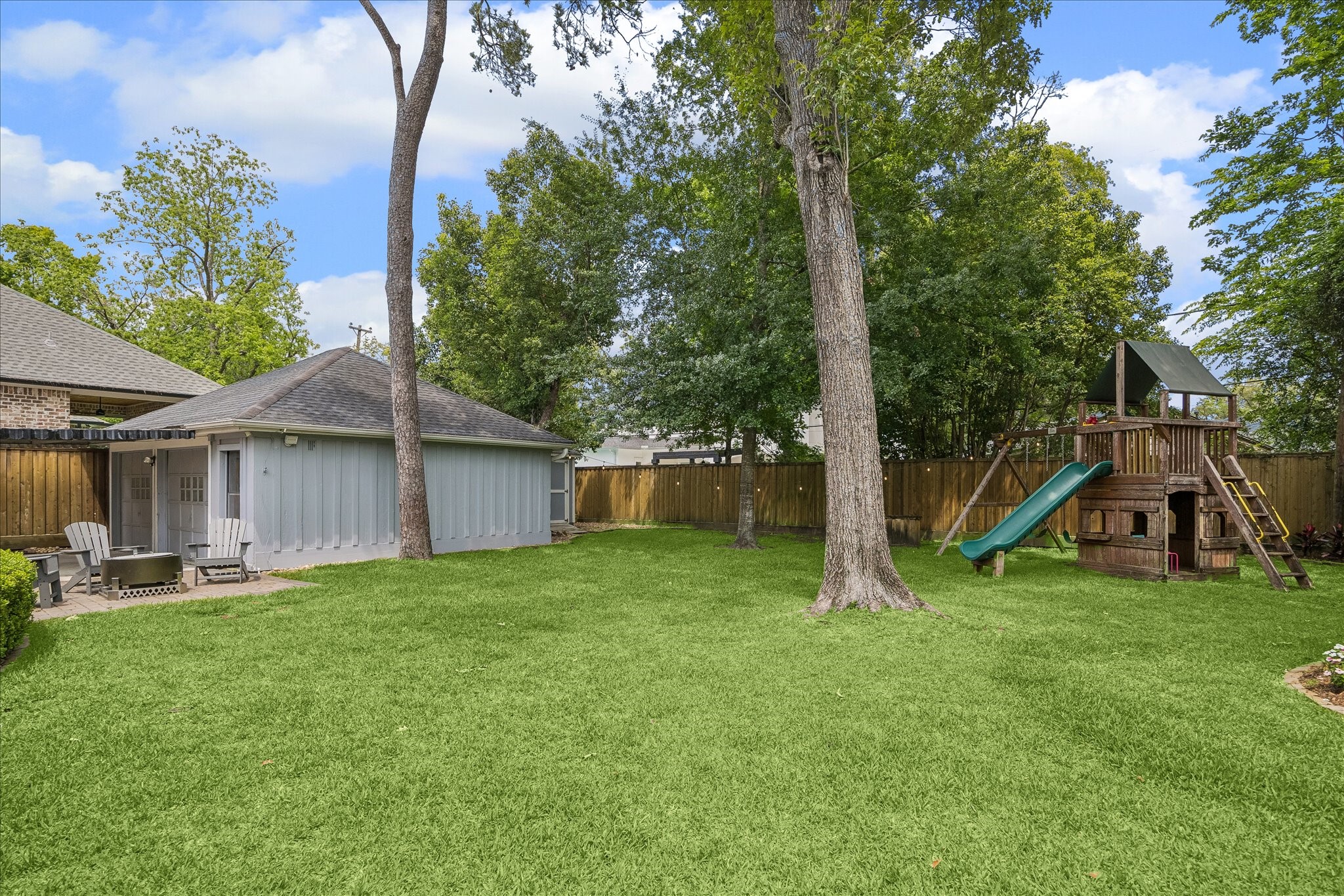 1018 Ben Hur Drive Spring Valley Village, TX 77055 - Photo 25 of 30 A paved patio provides a perfect spot to relax and watch your loved ones run and play.