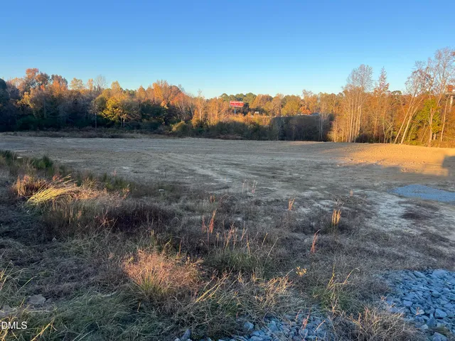 a view of lake with green space