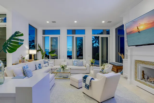 a bedroom with furniture and flat screen tv