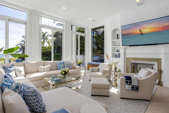 a bathroom with a double vanity sink a toilet and shower