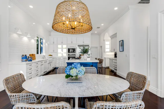 a living room with furniture or wooden floor and a large window