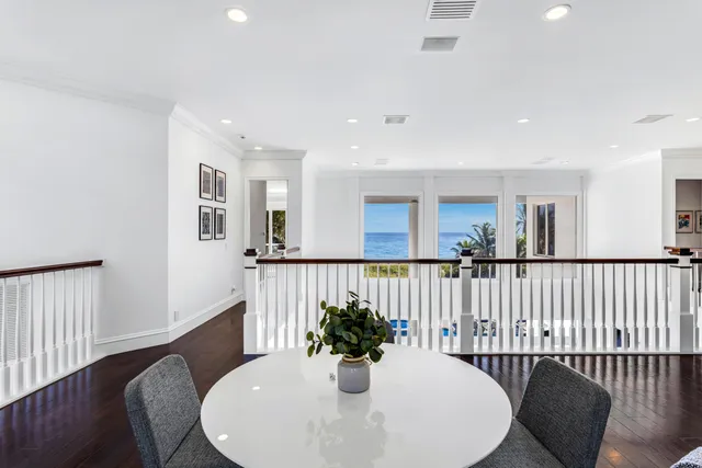 a bedroom with a large bed and a large window