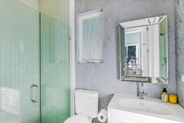 a view of a backyard of a house with a garden