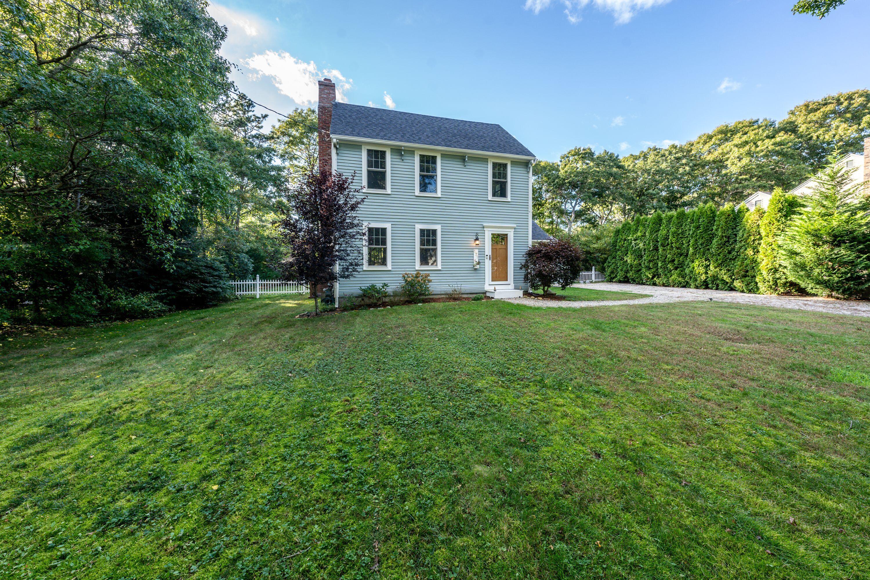 171 Cap'n Lijah's Road Centerville, MA 02632 - Photo 30 of 31 a view of a house with a yard