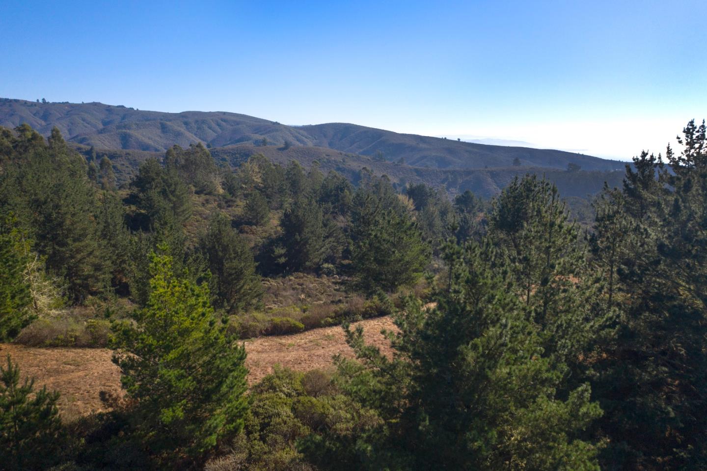 60 Bay View Montara, CA 94037 - Photo 8 of 9 a view of a dry yard with mountains in the background