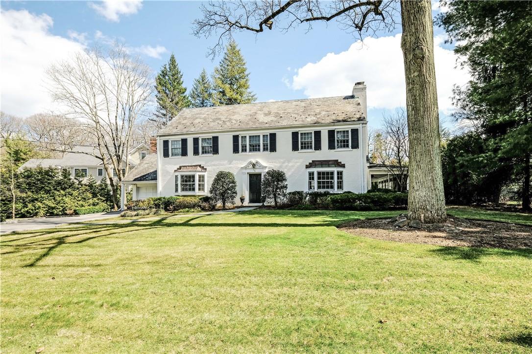 172 Fox Meadow Road Scarsdale, NY 10583 - Photo 1 of 1 a front view of a house with swimming pool