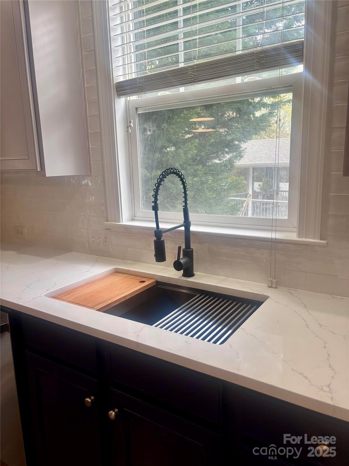 18705 The Commons Boulevard Cornelius, NC 28031 - Photo 6 of 19 a sink with a window