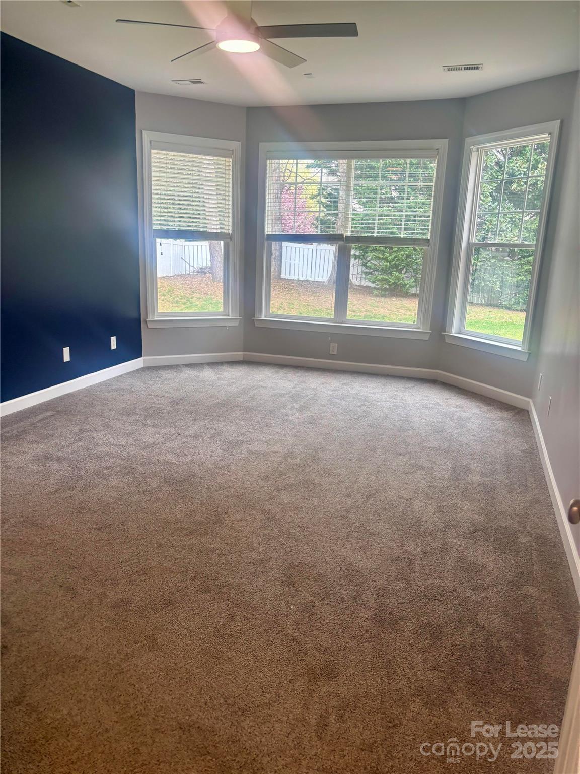 18705 The Commons Boulevard Cornelius, NC 28031 - Photo 9 of 19 a view of an empty room with a window