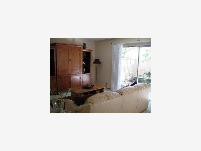 1105 Reed Avenue, Unit 0B Sunnyvale, CA 94086 - Photo 3 of 9 a living room with furniture and a large window