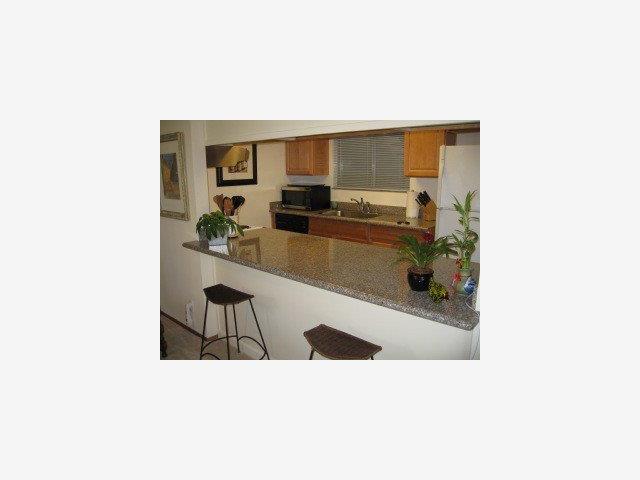 1105 Reed Avenue, Unit 0B Sunnyvale, CA 94086 - Photo 5 of 9 a kitchen with a sink cabinets and a window