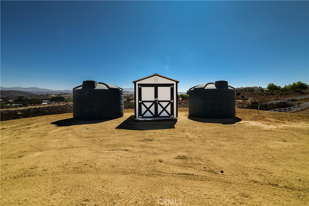 40495 East Benton Road Temecula, CA 92592 - Photo 40 of 45 a view of a terrace with wooden floor