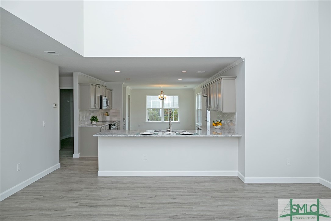 10 Fitzwater Road Port Wentworth, GA 31407 - Photo 11 of 48 Island kitchen with counter height bar. Laundry ro