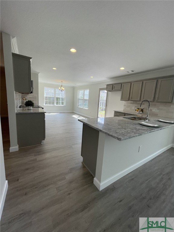10 Fitzwater Road Port Wentworth, GA 31407 - Photo 12 of 48 Island kitchen with counter height bar featuring n