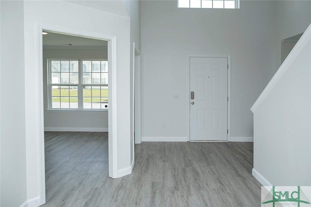 10 Fitzwater Road Port Wentworth, GA 31407 - Photo 3 of 48 View of foyer from living room. To the left is the