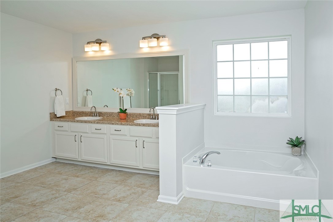 10 Fitzwater Road Port Wentworth, GA 31407 - Photo 36 of 48 Primary ensuite featuring fresh paint
and LOTS o