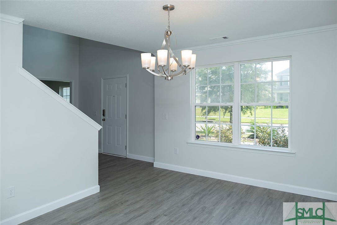 10 Fitzwater Road Port Wentworth, GA 31407 - Photo 6 of 48 Formal dining room with entry to island kitchen.