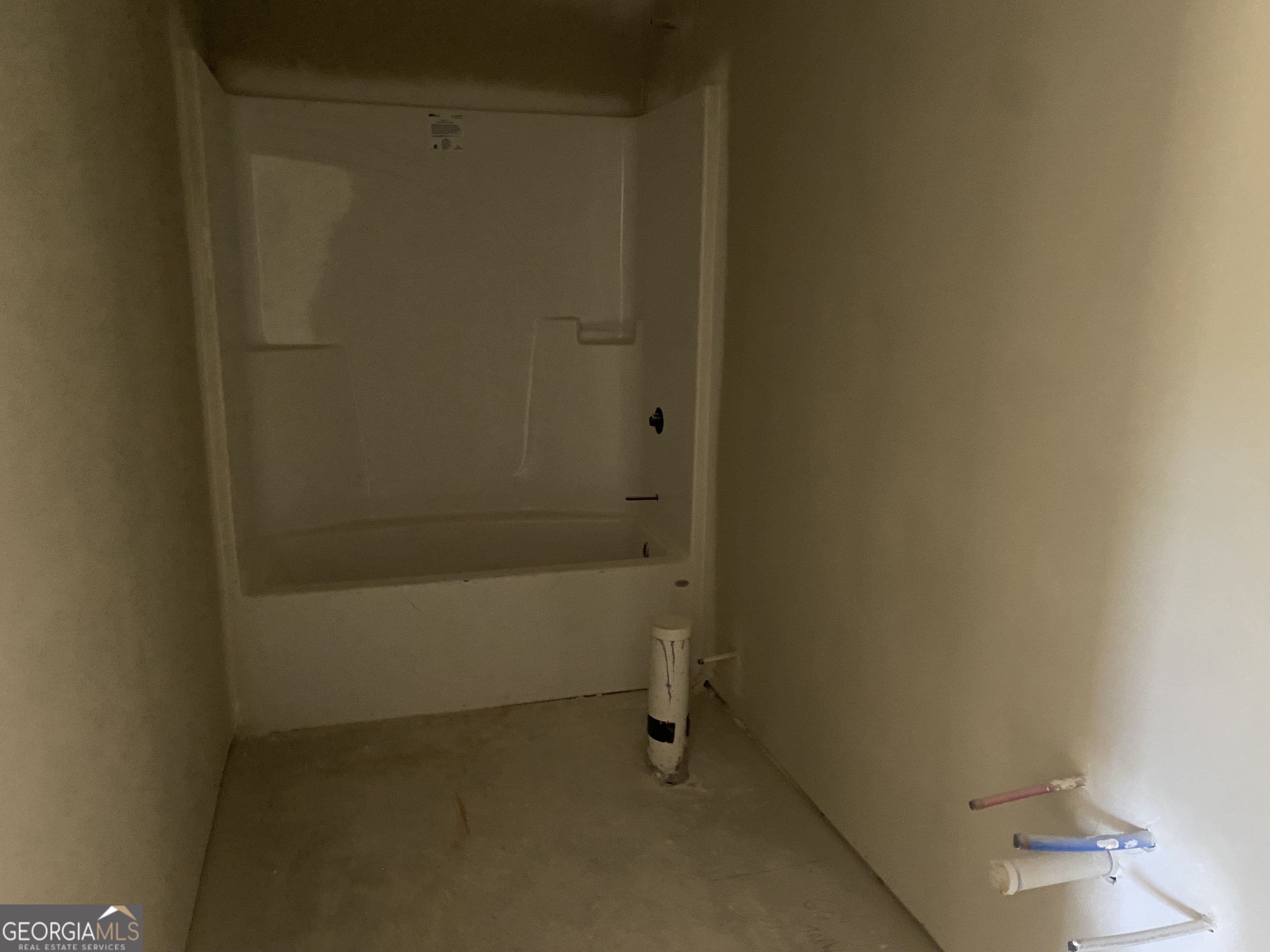 166 Mathews Road Milner, GA 30257 - Photo 13 of 14 a bathroom with a bathtub