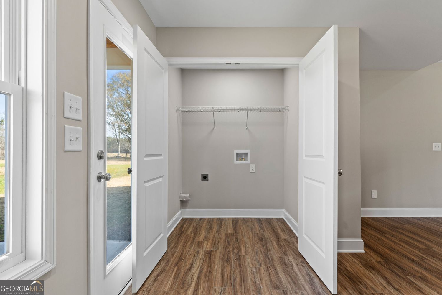 166 Mathews Road Milner, GA 30257 - Photo 14 of 32 a view of a bathroom from a hallway