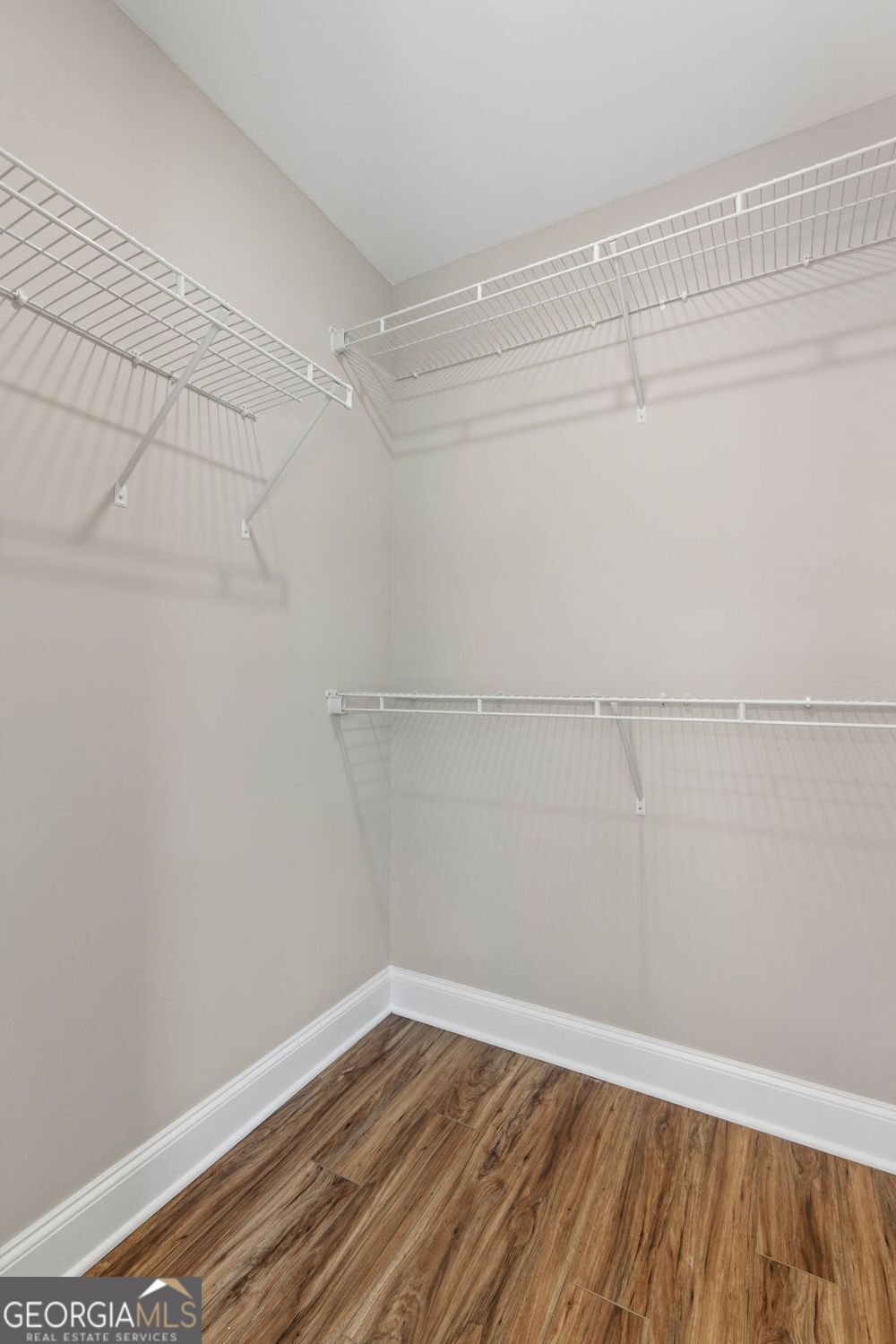 166 Mathews Road Milner, GA 30257 - Photo 21 of 32 a view of a room with racks on the wall