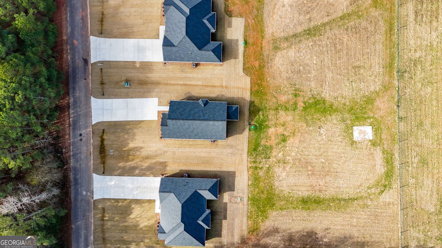 166 Mathews Road Milner, GA 30257 - Photo 31 of 32 a brick building with a door