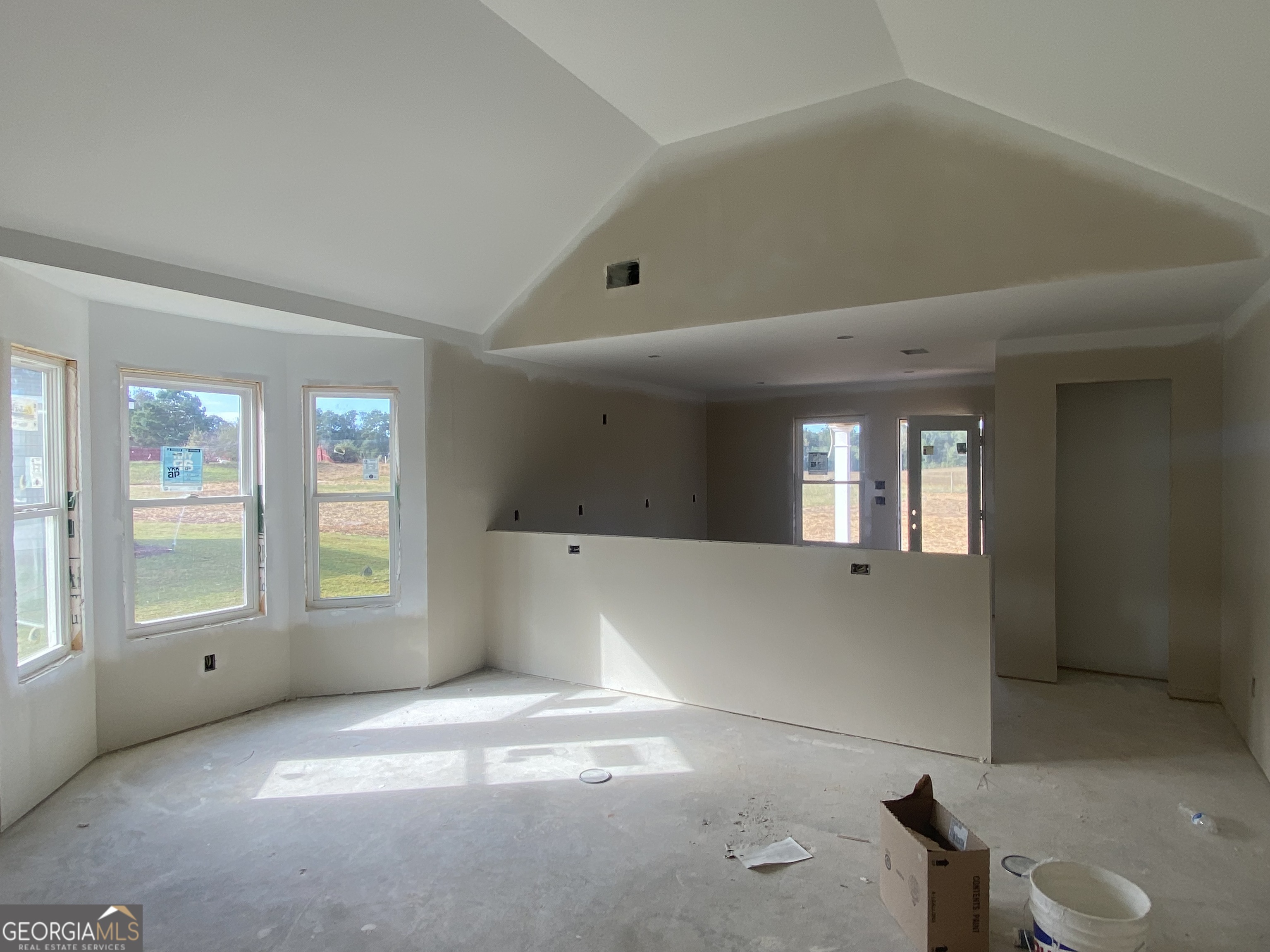 166 Mathews Road Milner, GA 30257 - Photo 8 of 14 a view of an empty room with a window