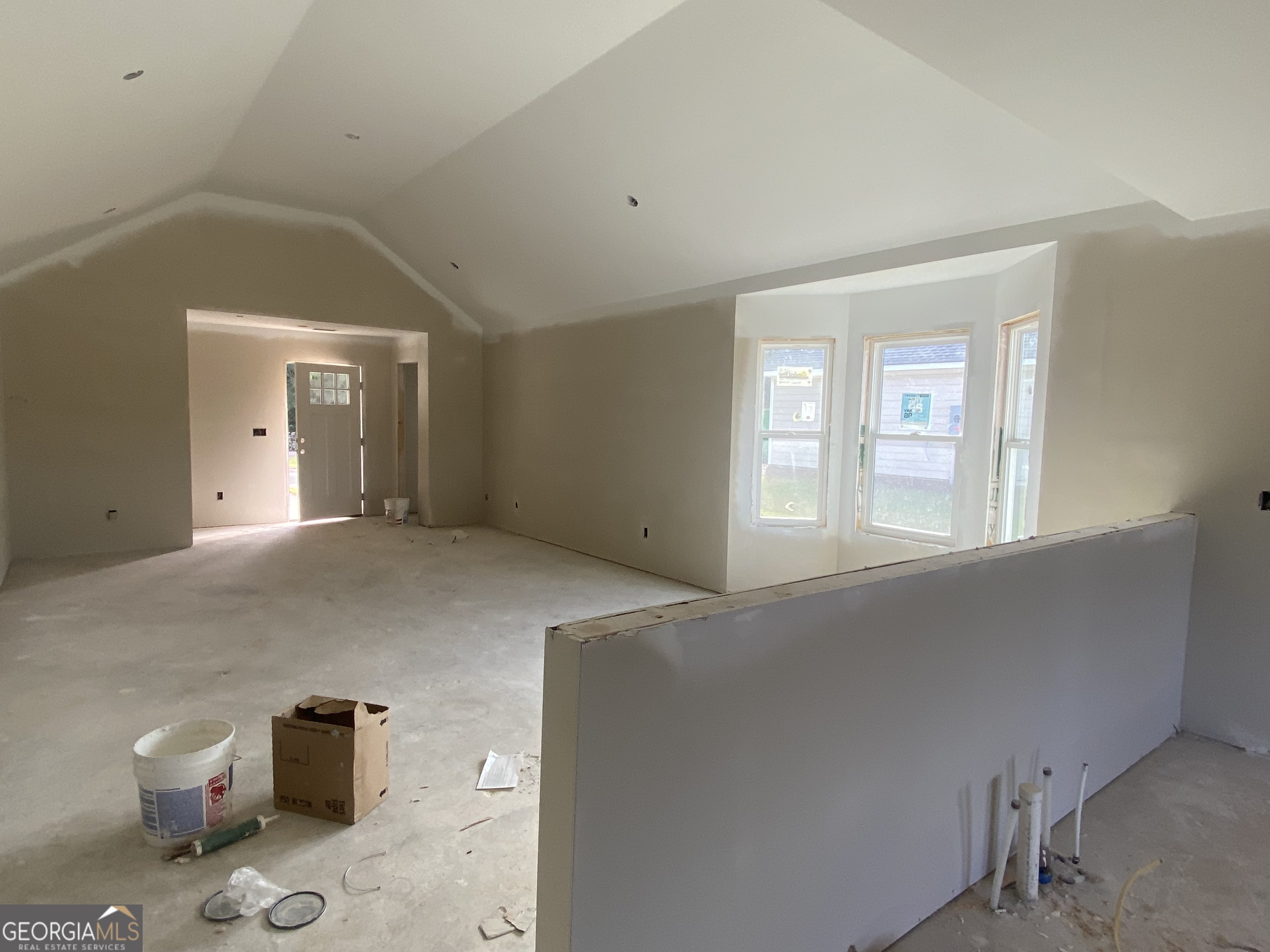 166 Mathews Road Milner, GA 30257 - Photo 9 of 14 a living room with furniture and a window