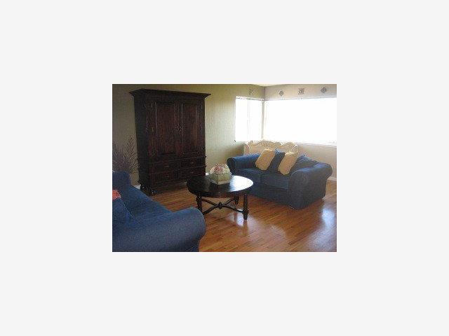 863 Amesti Road Watsonville, CA 95076 - Photo 3 of 9 a living room with furniture and a window
