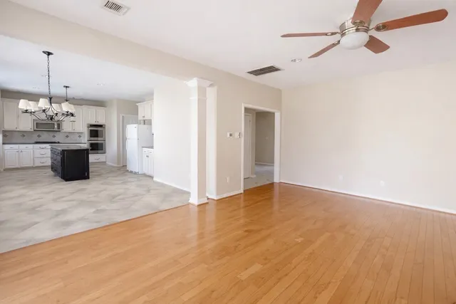 a view of a kitchen with a sink and cabinet area
