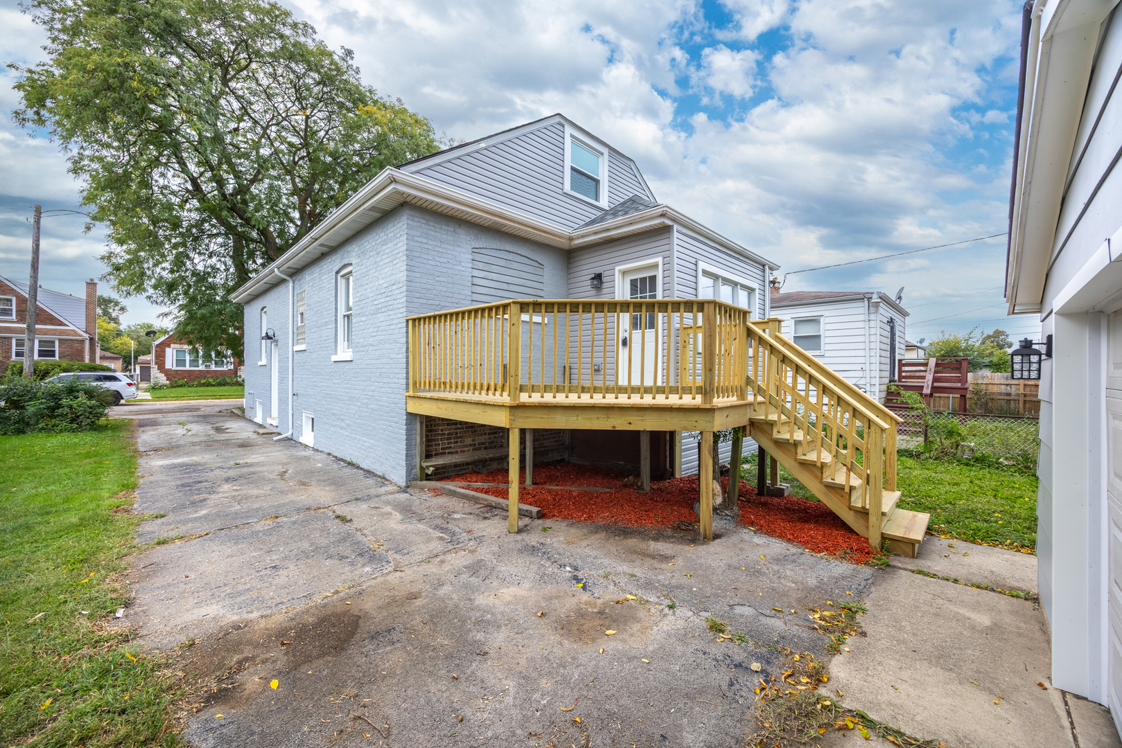21 East 140th Court Riverdale, IL 60827 - Photo 27 of 29 a view of a house with a yard