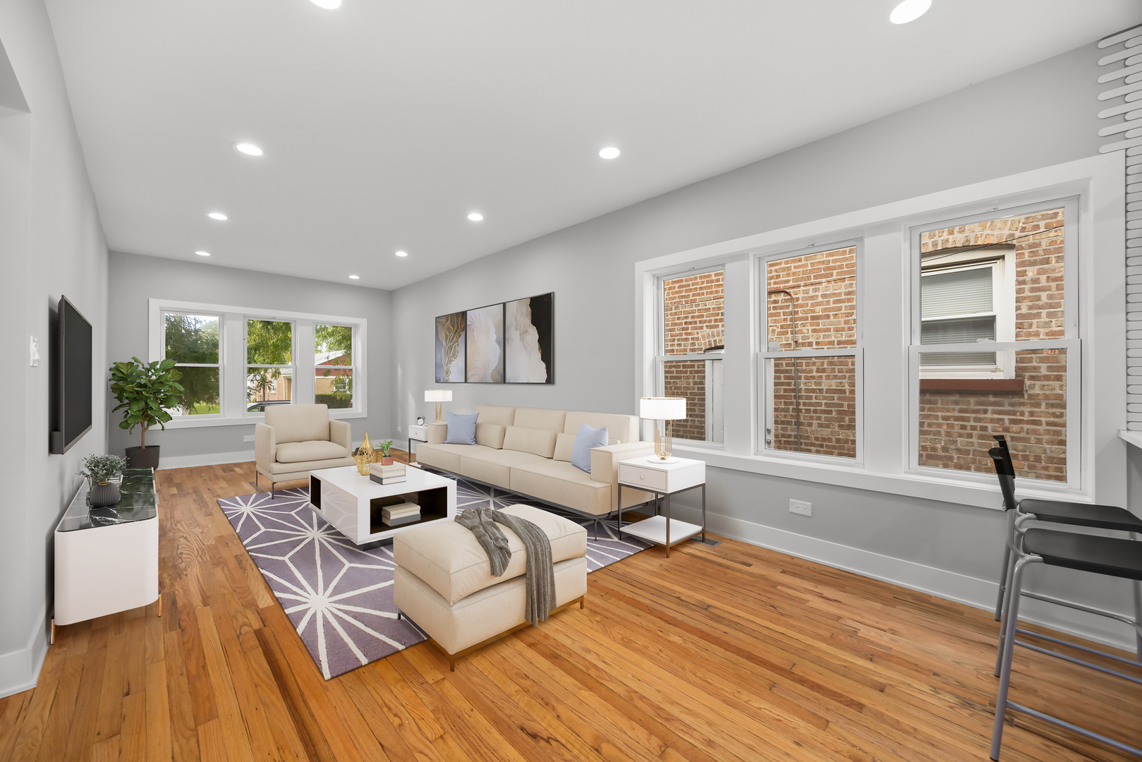 21 East 140th Court Riverdale, IL 60827 - Photo 3 of 29 a living room with furniture and a large window