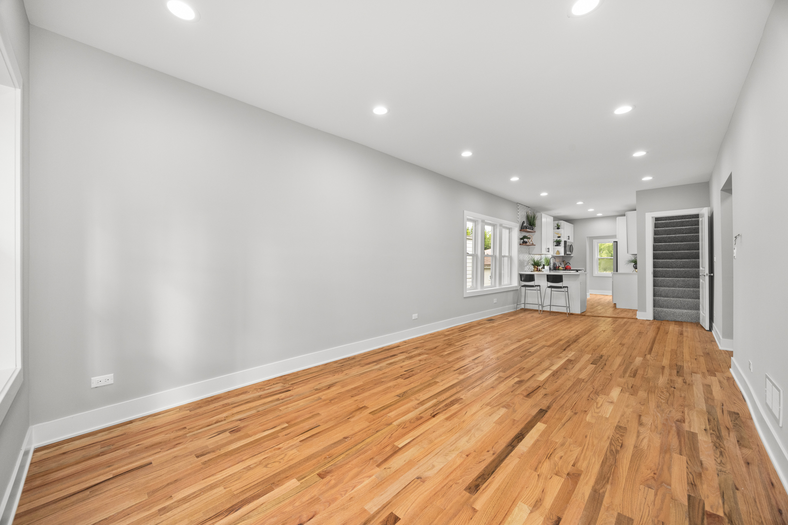 21 East 140th Court Riverdale, IL 60827 - Photo 7 of 29 a view of empty room with wooden floor