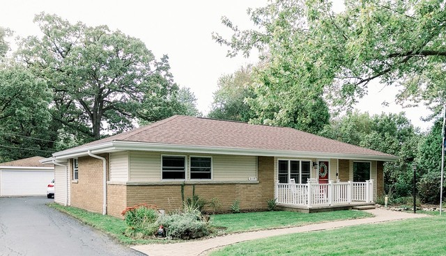 2119 Fairfield Road Lindenhurst, IL 60046 - Photo 1 of 22 a front view of a house with a yard