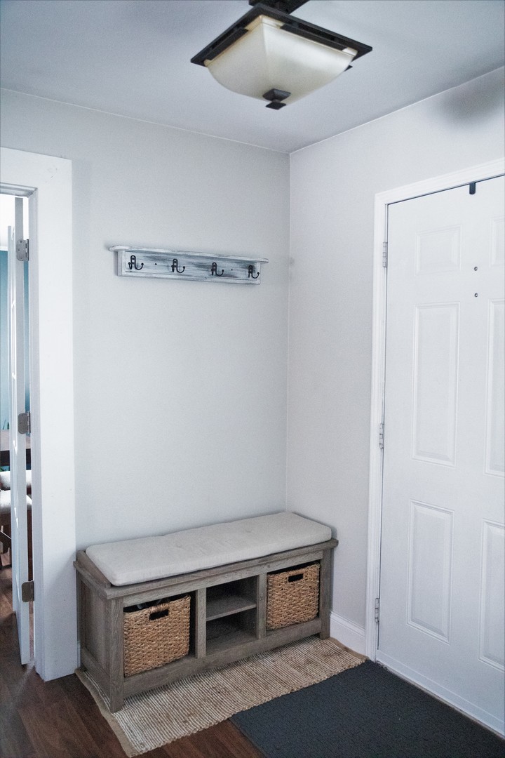 2119 Fairfield Road Lindenhurst, IL 60046 - Photo 17 of 22 a room with wooden floor and ceiling fan